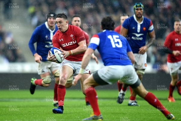 010219 - France v Wales - Guinness 6 Nations 2019 - Josh Adams of Wales takes on Maxime Medard of France