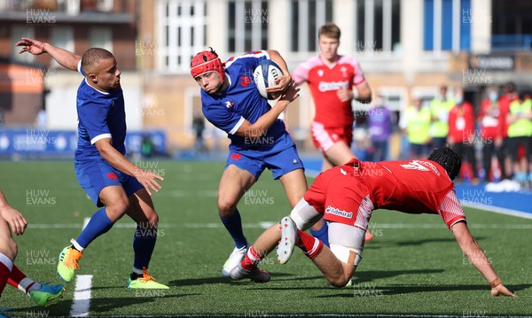 010721 - France v Wales - U20s 6 Nations Championship - Louis Bielle Biarrey of France is tackled by Alex Mann of Wales
