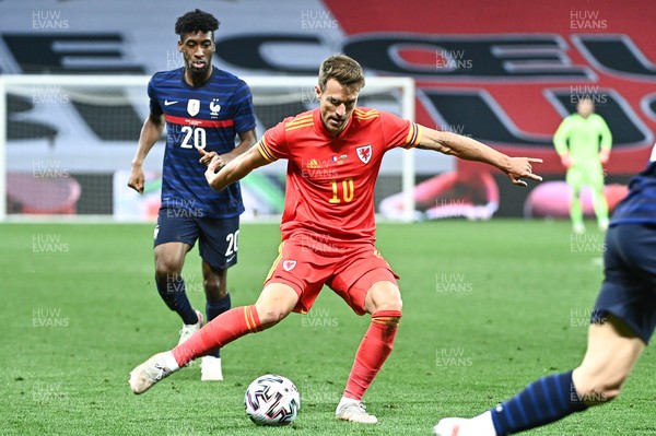 020621 - France v Wales - International Friendly - Aaron Ramsey of Wales and Kingsley Coman of France