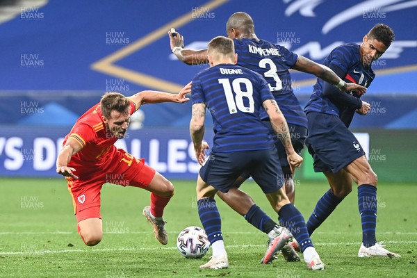 020621 - France v Wales - International Friendly - Aaron Ramsey of Wales, Lucas Digne of France, Presnel Kimpembe of France and Raphael Varane of France