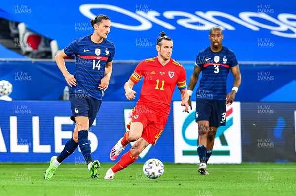 020621 - France v Wales - International Friendly - Adrien Rabiot of France, Gareth Bale of Wales and Presnel Kimpembe of France