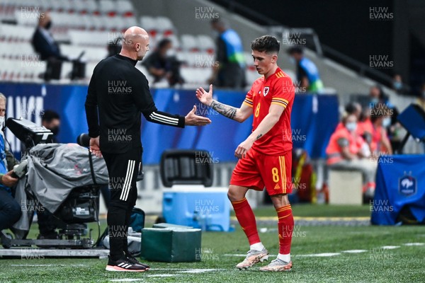 020621 - France v Wales - International Friendly - Harry Wilson of Wales shakes hands with caretaker manager Rob Page