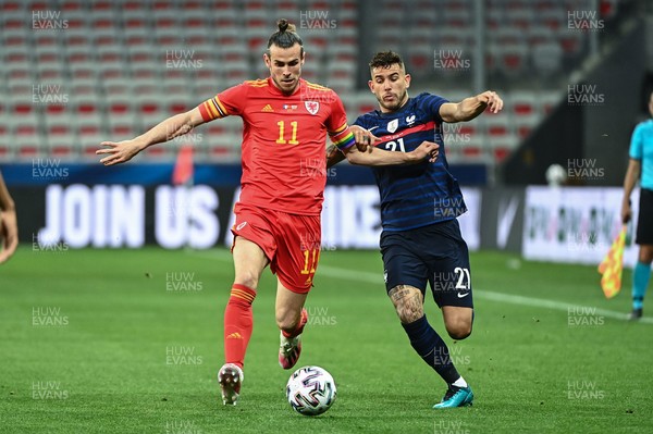 020621 - France v Wales - International Friendly - Gareth Bale of Wales and Lucas Hernandez of France
