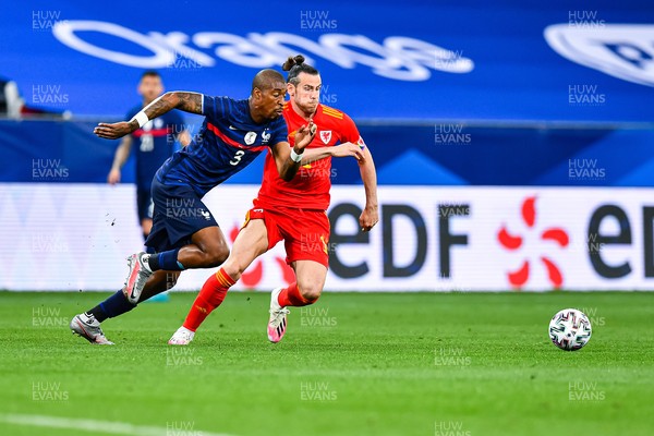 020621 - France v Wales - International Friendly - Presnel Kimpembe of France and Gareth Bale of Wales