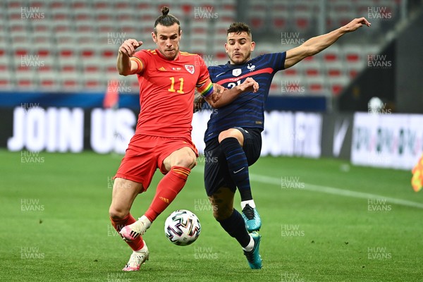 020621 - France v Wales - International Friendly - Gareth Bale of Wales  and Lucas Hernandez of France
