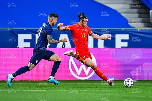 020621 - France v Wales - International Friendly - Lucas Hernandez of France and Gareth Bale of Wales