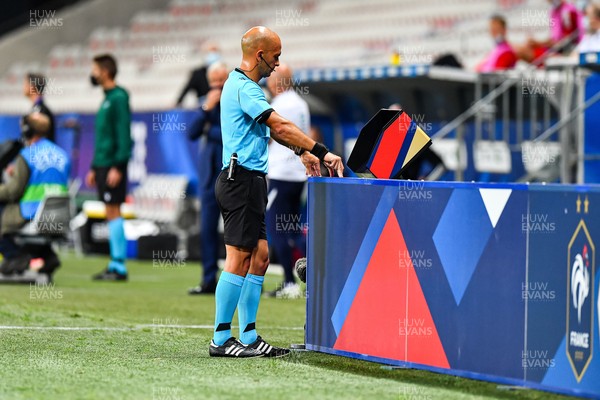020621 - France v Wales - International Friendly - Referee Luis Godinho consults the VAR