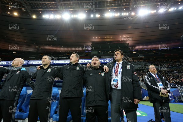 101117 - France v Wales - International Friendly - Wales Manager Chris Coleman and staff sing the anthem