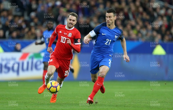 101117 - France v Wales - International Friendly - Laurent Koscielny of France is challenged by Aaron Ramsey of Wales
