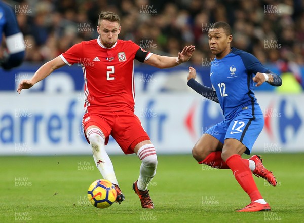 101117 - France v Wales - International Friendly - Kylian Mbappe of France is challenged by Chris Gunter of Wales