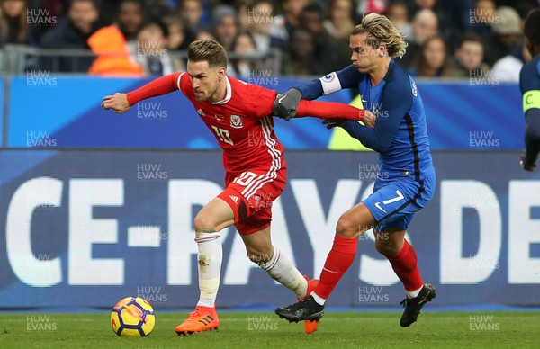 101117 - France v Wales - International Friendly - Aaron Ramsey of Wales is challenged by Antoine Griezmann of France