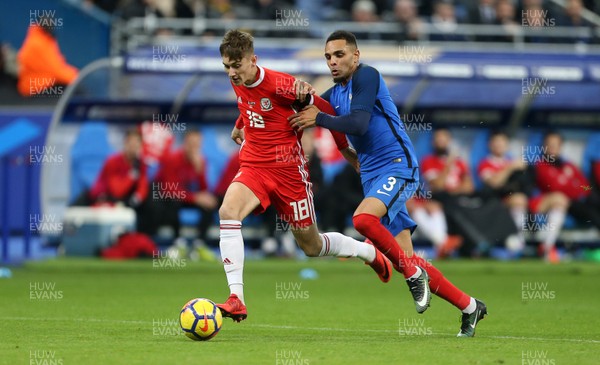101117 - France v Wales - International Friendly - David Brooks of Wales is challenged by Leyvin Kurrawa of France