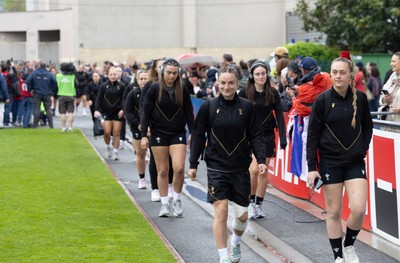 120425 - France v Wales, Guinness Women’s Six Nations 2025 - Hannah Jones of Wales and Jasmine Joyce of Wales lead the team as they arrive at the stadium
