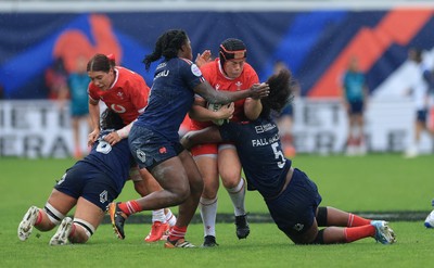 120425 - France v Wales, Guinness Women’s Six Nations 2025 - Carys Phillips of Wales is held