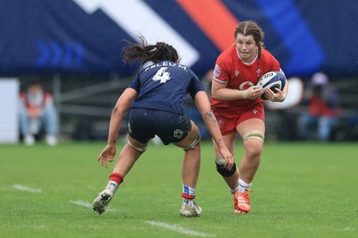 120425 - France v Wales, Guinness Women’s Six Nations 2025 - Kate Williams of Wales takes on Manae Feleu of France