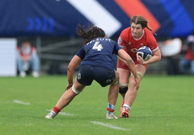 120425 - France v Wales, Guinness Women’s Six Nations 2025 - Kate Williams of Wales takes on Manae Feleu of France