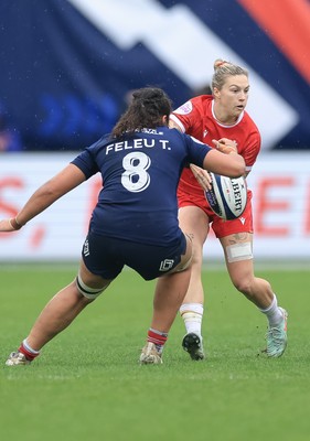 120425 - France v Wales, Guinness Women’s Six Nations 2025 - Keira Bevan of Wales takes on Teani Feleu of France