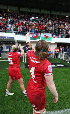 120425 - France v Wales, Guinness Women’s Six Nations 2025 - Abbie Fleming of Wales and Kelsey Jones of Wales applaud the fans at the end of the match