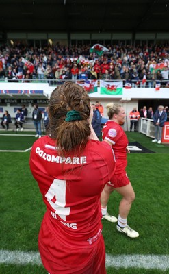 120425 - France v Wales, Guinness Women’s Six Nations 2025 - Abbie Fleming of Wales and Kelsey Jones of Wales applaud the fans at the end of the match