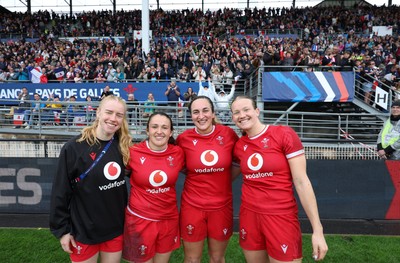 120425 - France v Wales, Guinness Women’s Six Nations 2025 - Cath Richards, Kayleigh Powell of Wales, Courtney Keight of Wales and Carys Cox of Wales applaud the French supporters at the end of the match