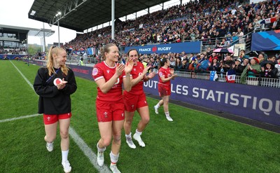 120425 - France v Wales, Guinness Women’s Six Nations 2025 - Cath Richards, Kayleigh Powell of Wales, Courtney Keight of Wales and Carys Cox of Wales applaud the French supporters at the end of the match