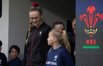120425 - France v Wales, Guinness Women’s Six Nations 2025 -Wales Captain Hannah Jones waits to walk out for the match with a match mascot