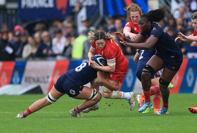 120425 - France v Wales, Guinness Women’s Six Nations 2025 - Gwen Crabb of Wales is tackled by Teani Feleu of France