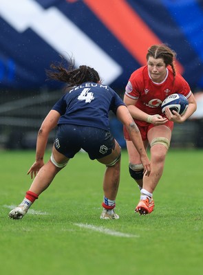 120425 - France v Wales, Guinness Women’s Six Nations 2025 - Kate Williams of Wales takes on Manae Feleu of France