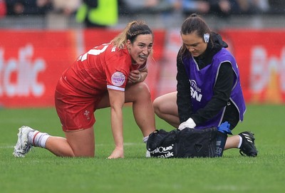 120425 - France v Wales, Guinness Women’s Six Nations 2025 - Cara Jones, Medic treats Courtney Keight of Wales