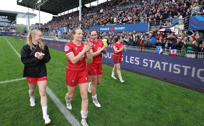 120425 - France v Wales, Guinness Women’s Six Nations 2025 - Cath Richards, Carys Cox of Wales, Courtney Keight of Wales and Kayleigh Powell of Wales applaud the French supporters at the end of the match