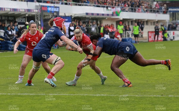 120425 - France v Wales, Guinness Women’s Six Nations 2025 - Keira Bevan of Wales is tackled short of the line