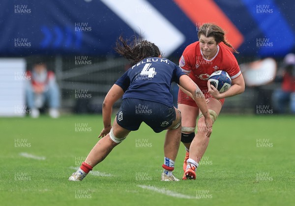 120425 - France v Wales, Guinness Women’s Six Nations 2025 - Kate Williams of Wales takes on Manae Feleu of France