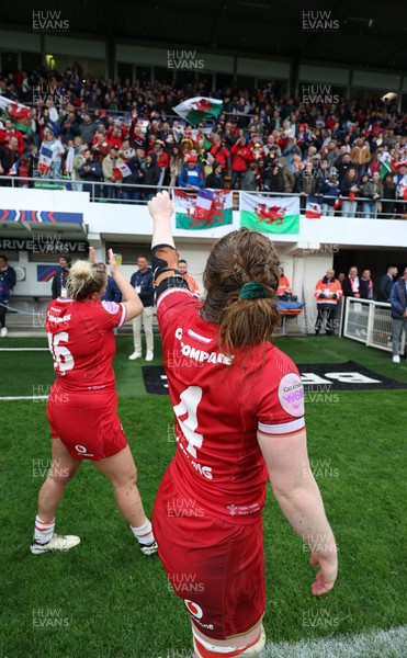 120425 - France v Wales, Guinness Women’s Six Nations 2025 - Abbie Fleming of Wales and Kelsey Jones of Wales applaud the fans at the end of the match