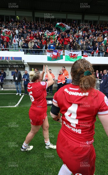 120425 - France v Wales, Guinness Women’s Six Nations 2025 - Abbie Fleming of Wales and Kelsey Jones of Wales applaud the fans at the end of the match