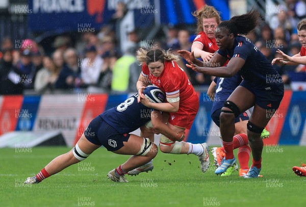 120425 - France v Wales, Guinness Women’s Six Nations 2025 - Gwen Crabb of Wales is tackled by Teani Feleu of France