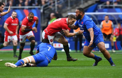 180323 - France v Wales - Guinness Six Nations - George North of Wales is tackled by Charles Ollivon and Uini Atonio of France 