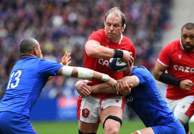 180323 - France v Wales - Guinness Six Nations - Alun Wyn Jones of Wales is tackled by Gael Fickou of France 