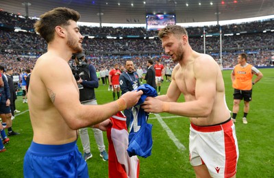 180323 - France v Wales - Guinness Six Nations - Romain Ntamack of France and Dan Biggar of Wales swap jerseys at full time