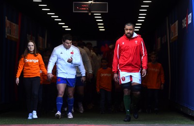 180323 - France v Wales - Guinness Six Nations - Antoine Dupont of France and Taulupe Faletau of Wales lead out their sides