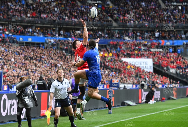 180323 - France v Wales - Guinness Six Nations - Josh Adams of Wales gets the ball back into play