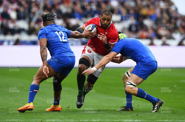 180323 - France v Wales - Guinness Six Nations - Taulupe Faletau of Wales is tackled by Jonathan Danty and Francois Cros of France 