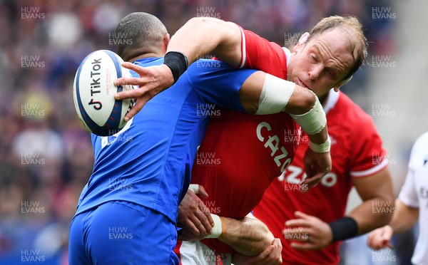 180323 - France v Wales - Guinness Six Nations - Alun Wyn Jones of Wales is tackled by Gael Fickou of France 
