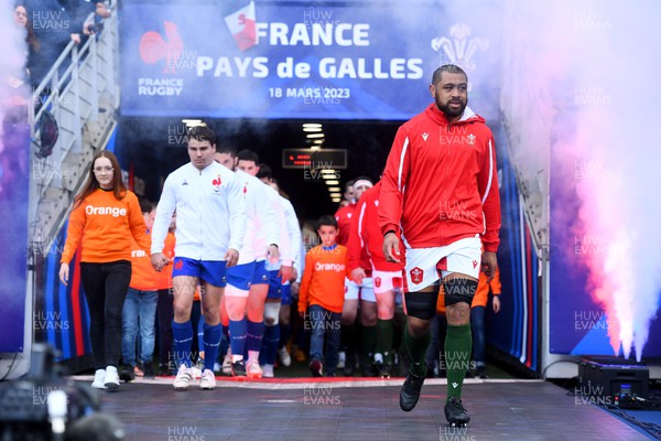 180323 - France v Wales - Guinness Six Nations - Antoine Dupont of France and Taulupe Faletau of Wales lead out their sides