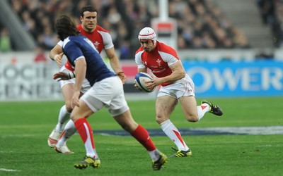 19.03.11 - France v Wales - RBS Six Nations 2011 - Leigh Halfpenny of Wales takes on Alexis Palisson of France. 