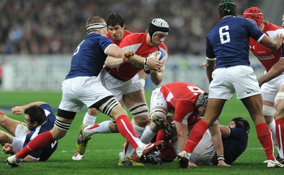 19.03.11 - France v Wales - RBS Six Nations 2011 - Ryan Jones of Wales is tackled by Imanol Harinordoquy of France. 