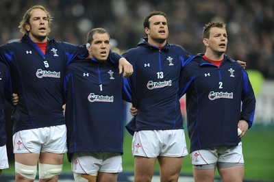 19.03.11 - France v Wales - RBS Six Nations 2011 - Alun Wyn Jones, Paul James, Jamie Roberts and Matthew Rees of Wales line up for the national anthems. 