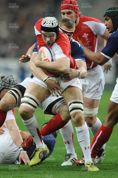 19.03.11 - France v Wales - RBS Six Nations 2011 - Ryan Jones of Wales is tackled by Imanol Harinordoquy of France. 