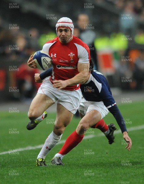 19.03.11 - France v Wales - RBS Six Nations 2011 - Leigh Halfpenny of Wales is tackled by Francois Trinh-Duc of France. 