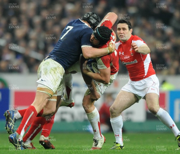 19.03.11 - France v Wales - RBS Six Nations 2011 - Jonathan Thomas of Wales is stopped by Julien Bonnaire of France. 