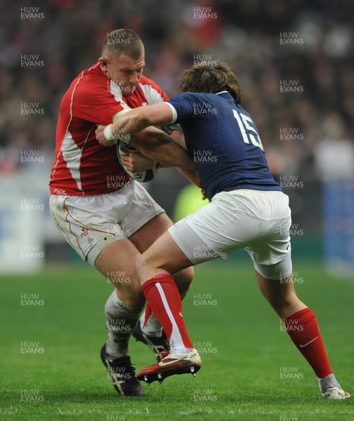 19.03.11 - France v Wales - RBS Six Nations 2011 - John Yapp of Wales takes on Maxime Medard of France. 
